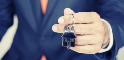 man holding house keys