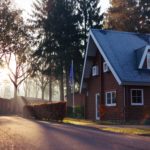 a-red-house-covered-by-high-value-home-insurance