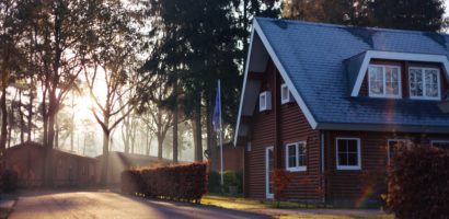 a-red-house-covered-by-high-value-home-insurance