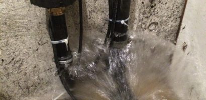 Pipe spewing water in basment