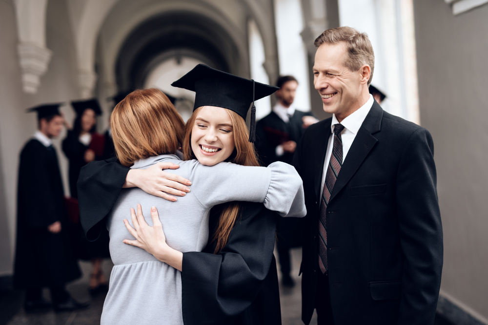 Parents congratulate the student, who finish their studies at the university.