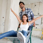 happy couple renovates home