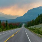 Mountain highway stretching through Jasper National Park during smoky wildfire conditions