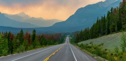 Mountain highway stretching through Jasper National Park during smoky wildfire conditions